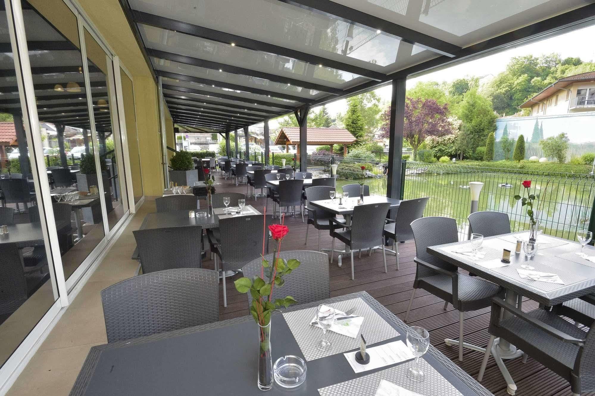 Hotel Aster Restaurant Aux Arcades Briey Exterior foto
